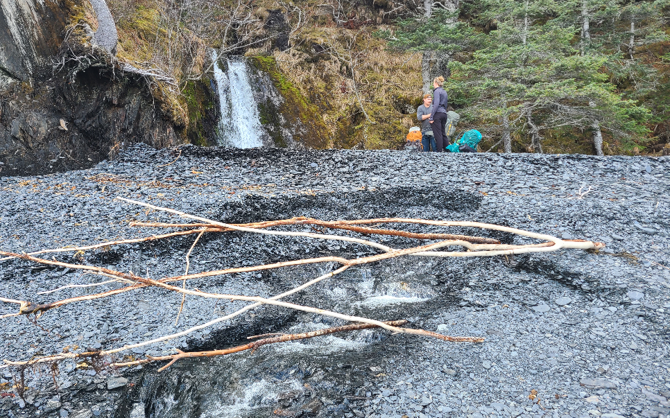 water filtering through rocks below pool