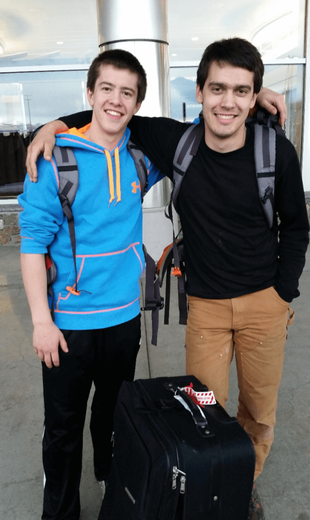standing in front of anchorage international airport about to leave