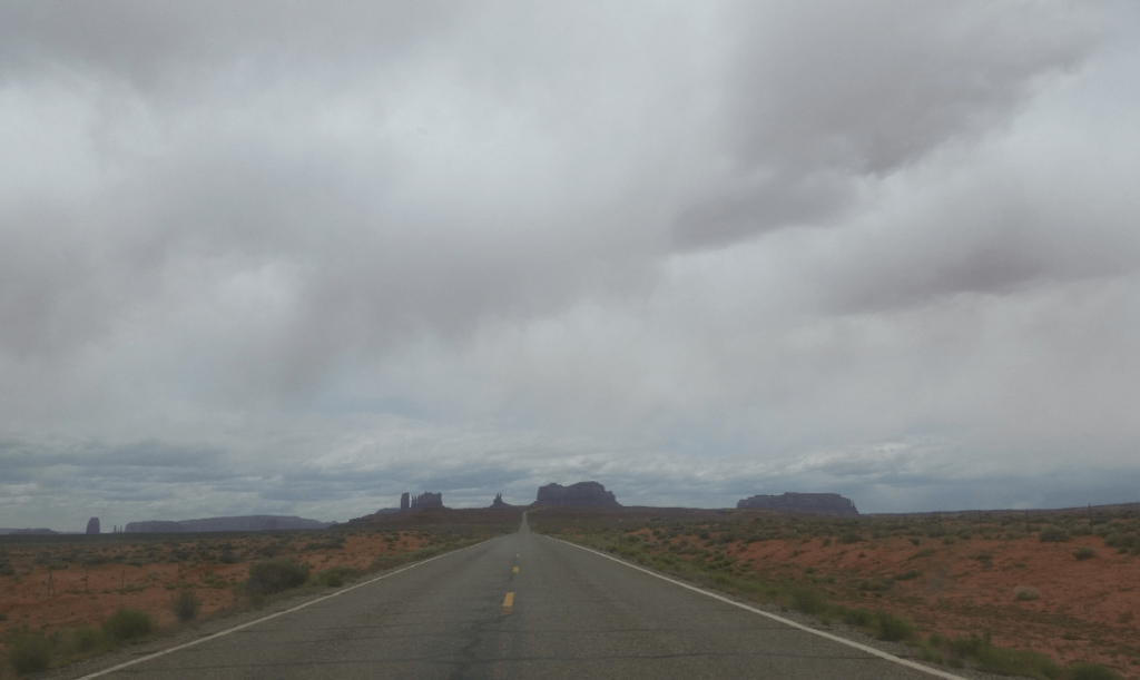 looking down a hill at desert rock formations made famous in the movie forrest gump