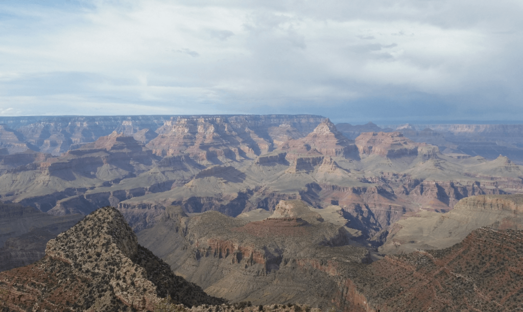 looking north up the grand canyon on a beautiful blue-sky day