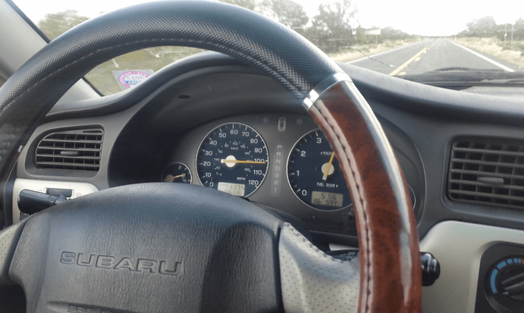 subaru baja dashboard showing a high rate of speed indicated