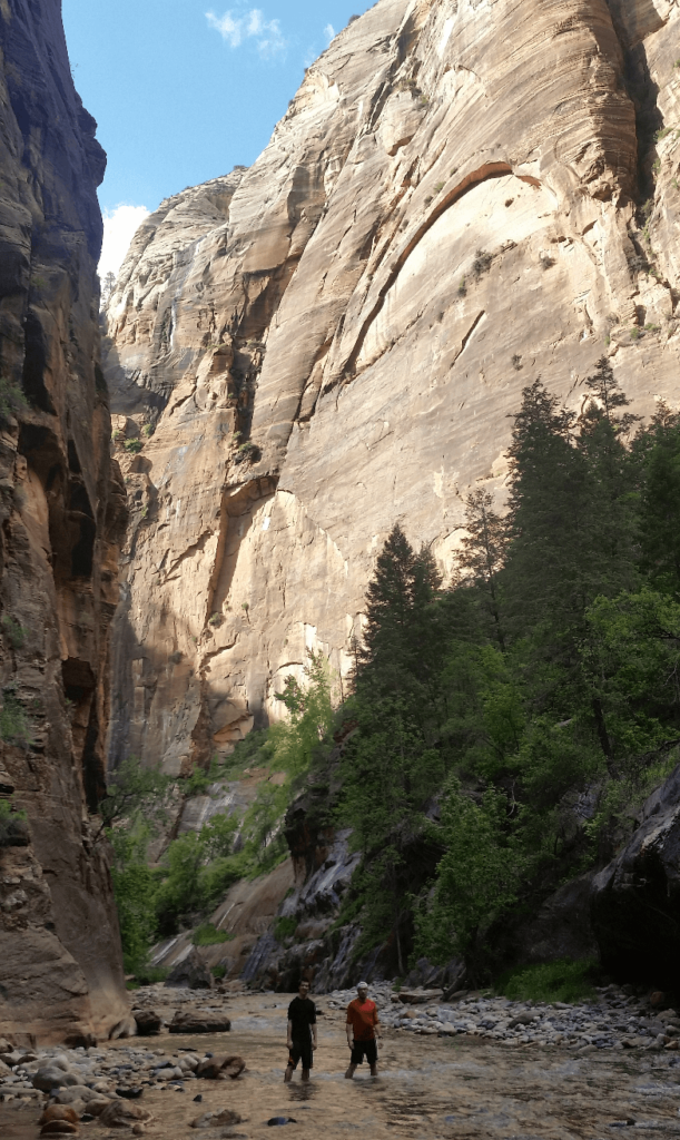 mike and joseph looking up at the enormous canyon walls ahead