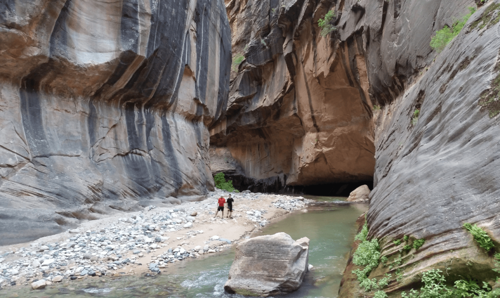 joseph and mike in a giant sandstone canyon
