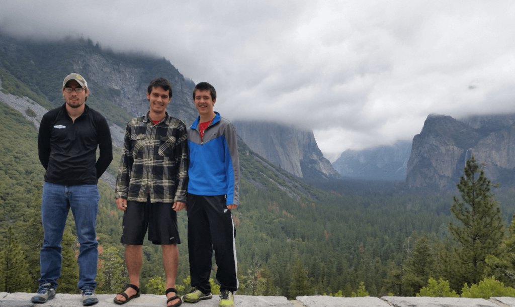 mike joseph and robert in front of the classic yosemite viewpoint with el capitan, half dome, and bridalveil falls behind